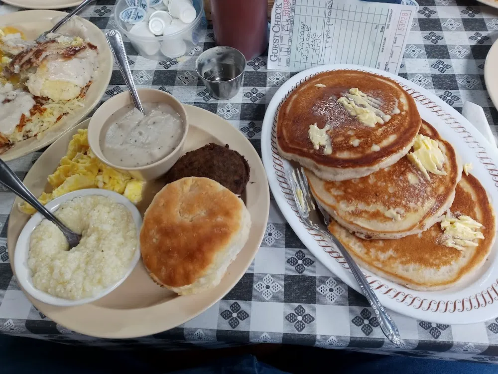 Sausage Platter with Grits and Side of Pancakes
